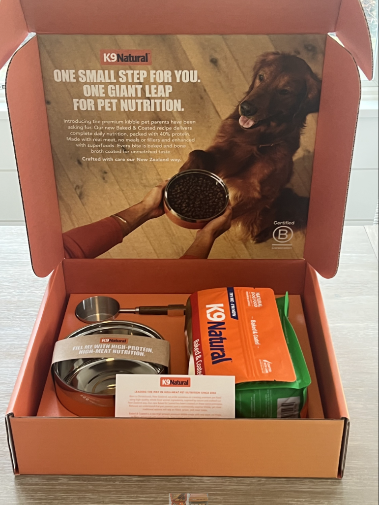 Open Baked and Coated launch kit showing product, bowl and printed collateral
